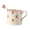 Beige cherry coffee cup-with spoon