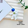 Astronauta piegato su blu-38*26 mm