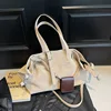 Kaki (avec petit sac) spot