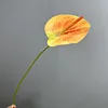 Silicone rouge irlandais main-jaune