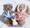 Orso in tuta da sci blu