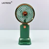 green handheld lash fan