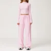 Pantaloni lunghi da tuta a maniche lunghe, color Sakura Powder.