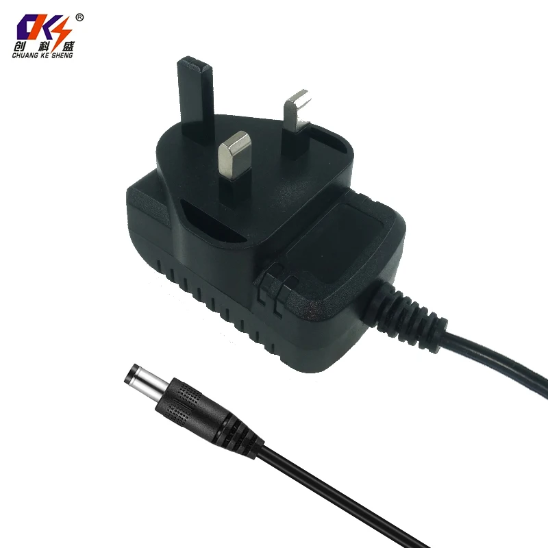 Certifikát UKCA stěnově montovaná britská zástrčka 24V 0,5A Ac Dc adaptér 500 mA napájecí adaptér 240,5A pro pásovou žárovku