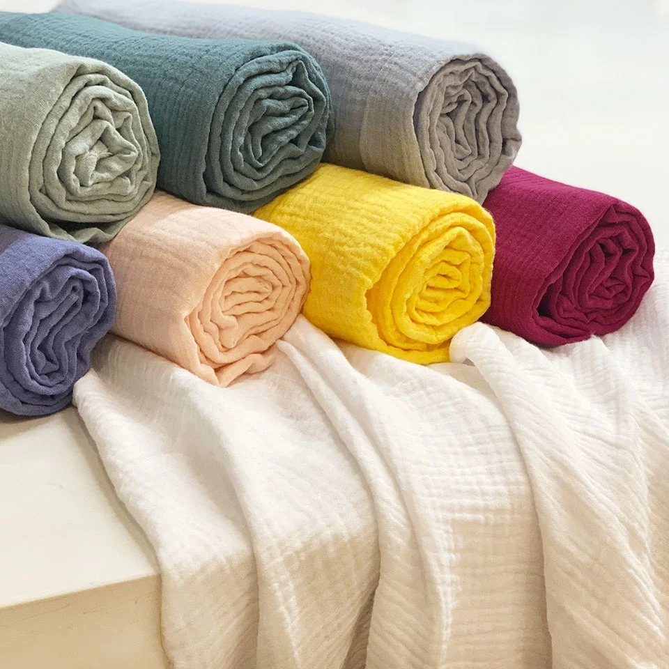 Cheap Swaddle Crepe 2 Layers Plain Dyed White Solid Color Rolls Double Gauze Wholesale 100% Cotton Muslin Fabric for Baby