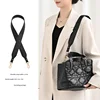 Black diamond-shaped underarm shoulder strap