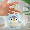 Pingüino travesti azul + hebilla dorada