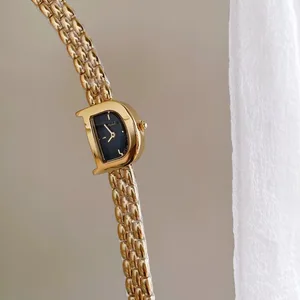 New Hot Selling Women Watch with Letter D Shape Stylish Golden Medieval Female Watch High-end, Elegant, and Noble Watch