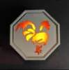 Talisman de poulet avec lumière