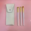 D 3 brush 1 cosmetic bag