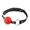 Palle rosse in pelle nera