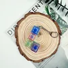 Capuchon transparent de couleur coque à quatre touches en forme de L mixte