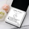Collana con croce benefica - confezione regalo ribaltabile in bianco e nero
