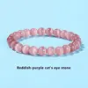 Red-purple cat eye stone