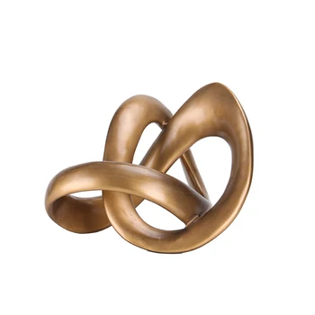 Designer Fuxury Resin decorative knot sculpture gold finishing for tabletop decor for office home decor hotels interior