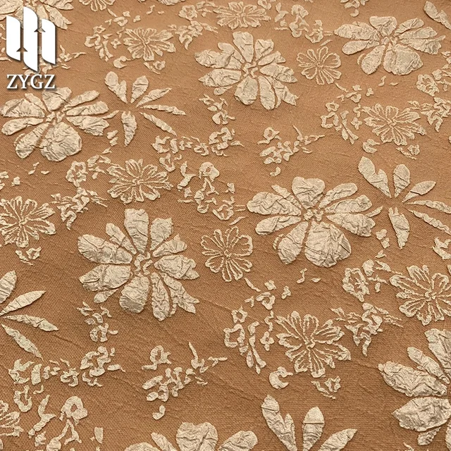 Polyester spandex jacquard fabric embossed jacquard African chrysanthemum fabric wholesale