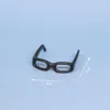 Hollow black, plastic glasses