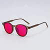 Olive green with red lens