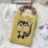 Scoiattolo giallo (manico + tracolla)