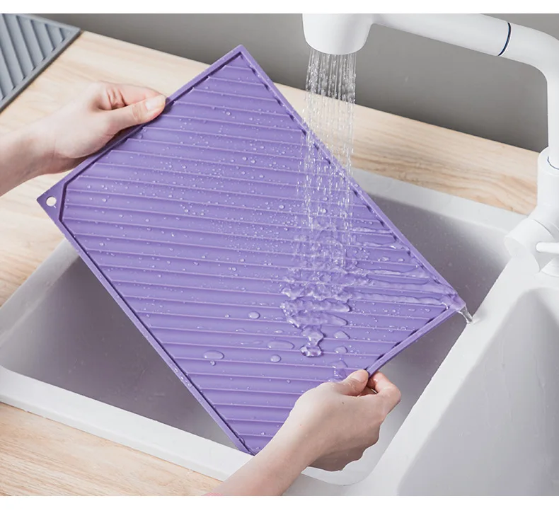Simple Silicone Heat Insulation Draining Mat Nordic Oil-Proof Design for Dining Tables and Household Use supplier