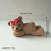 08-orso di peluche scuro sdraiato-rosso