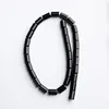 Black onyx tube beads approx. 8x12mm