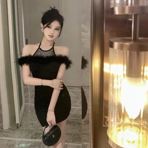 This Black Halter - Neck Evening Dress with Fluffy Fur Trim and Sparkles Exudes Luxury Ideal for Grand Events