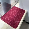 Piedras pequeñas - rojo vino