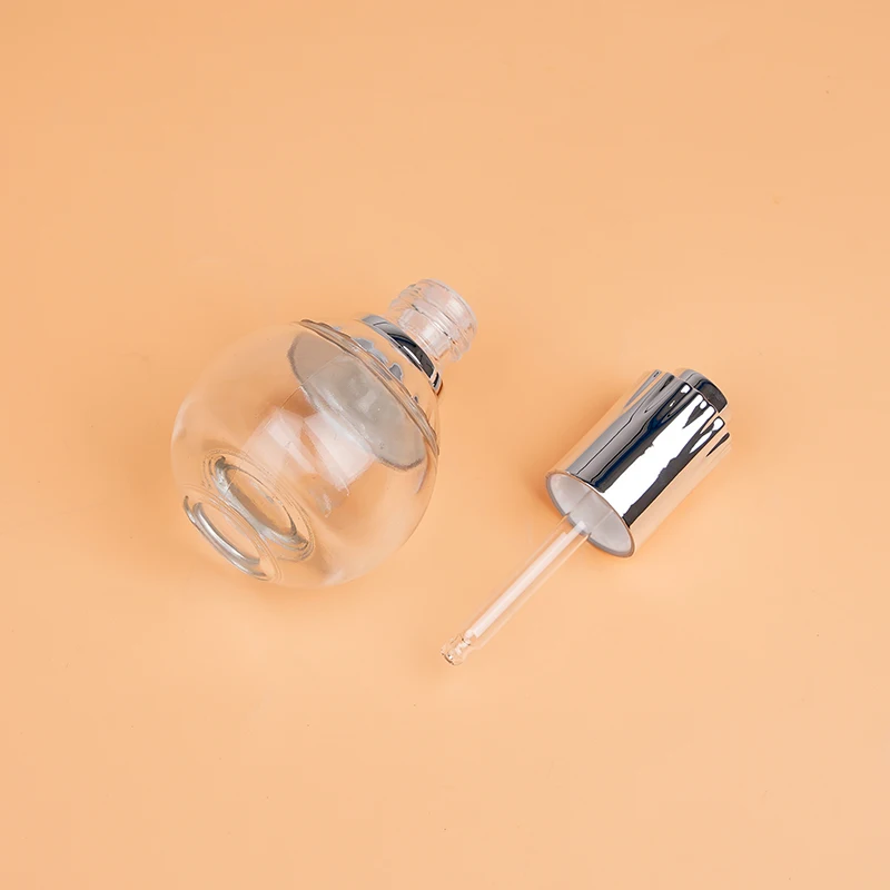 Design Spherical Clear Press Glass Dropper Bottles 30ml Facial Cleanser Skin Care Serum Sunscreen Cream Empty Packaging Polished