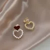 27-Love pearl ear clips