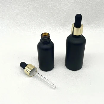 empty 30 ml 1 oz cosmetic cuticle hair essential oil bottles 30ml matte black glass dropper bottle with golde cap