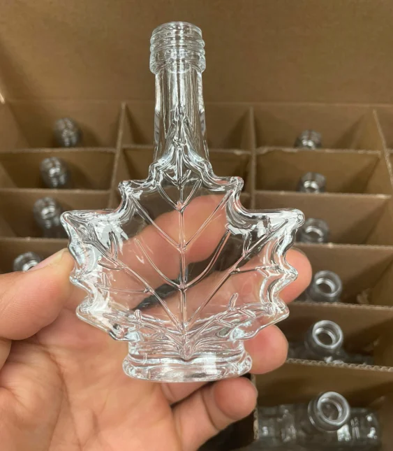 50ml 100ml 250ml Empty Maple Leaf Shaped Glass Syrup Bottle Glass Liquor Bottle With Screw Top
