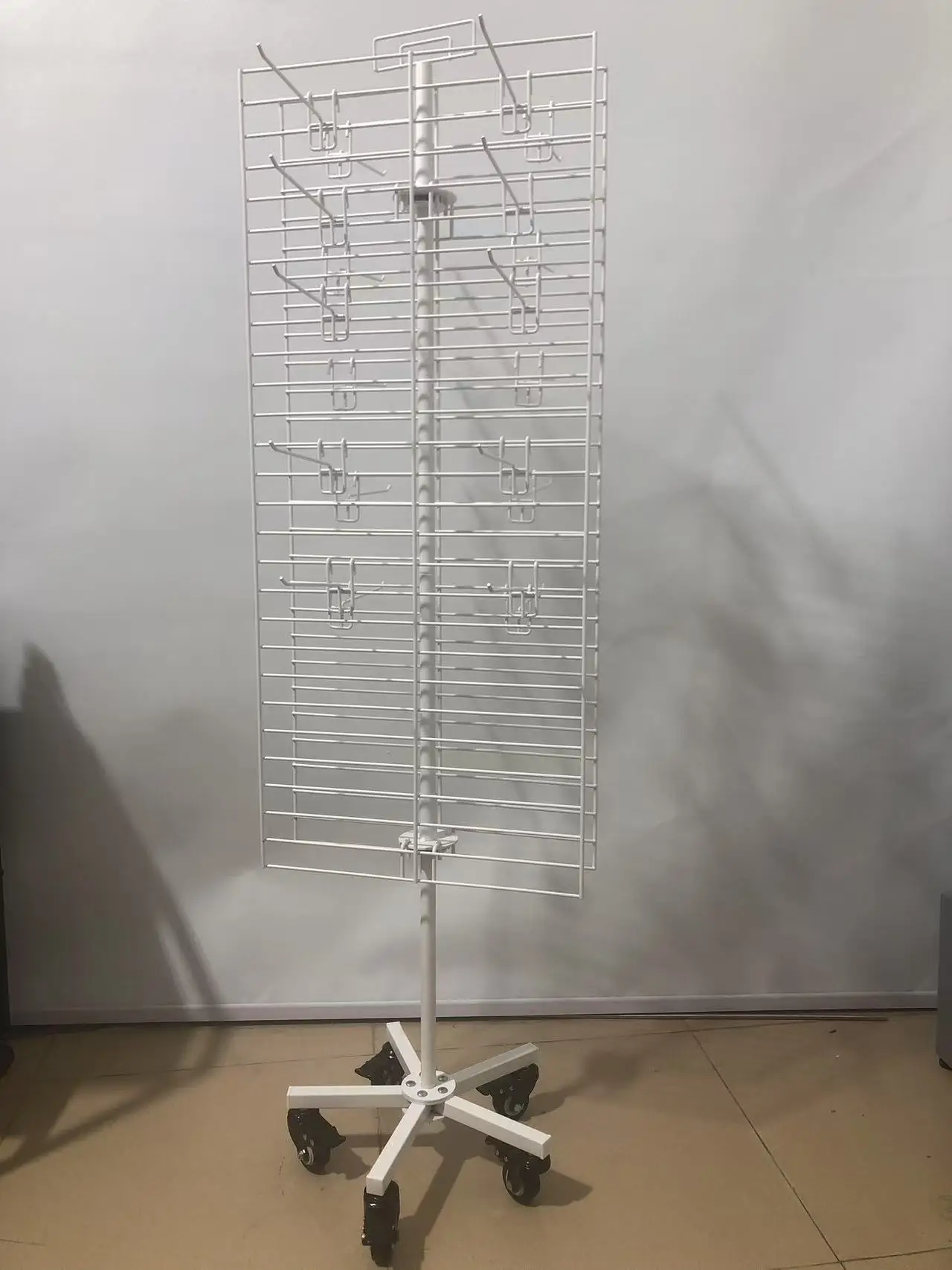 Double-side Iron Net Display Racks 360 Degree Rotation Metal Grid Gadget Display Stand with Removable Hooks and Caster