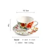 white cup and saucer