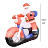 Le Père Noël fait de la moto