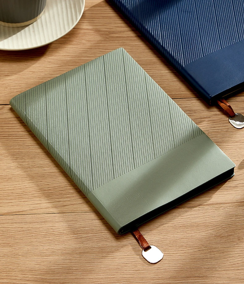 Promotional high-end a5 notebook supports fully customized business notebook high value customized logo with metal pendant books