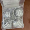 Ensemble de cinq pièces (en sachet ou en boîte) contenant 10 grammes de jouet de dentition