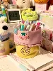 Estuche para lápices con diseño de cupcake de mantequilla.