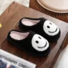 Black stitched smiley face