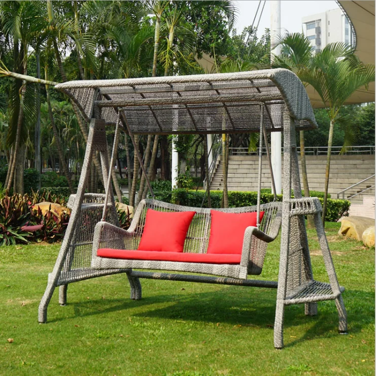 green patio swing with canopy