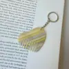 5 boucles argentées à rayures jaunes