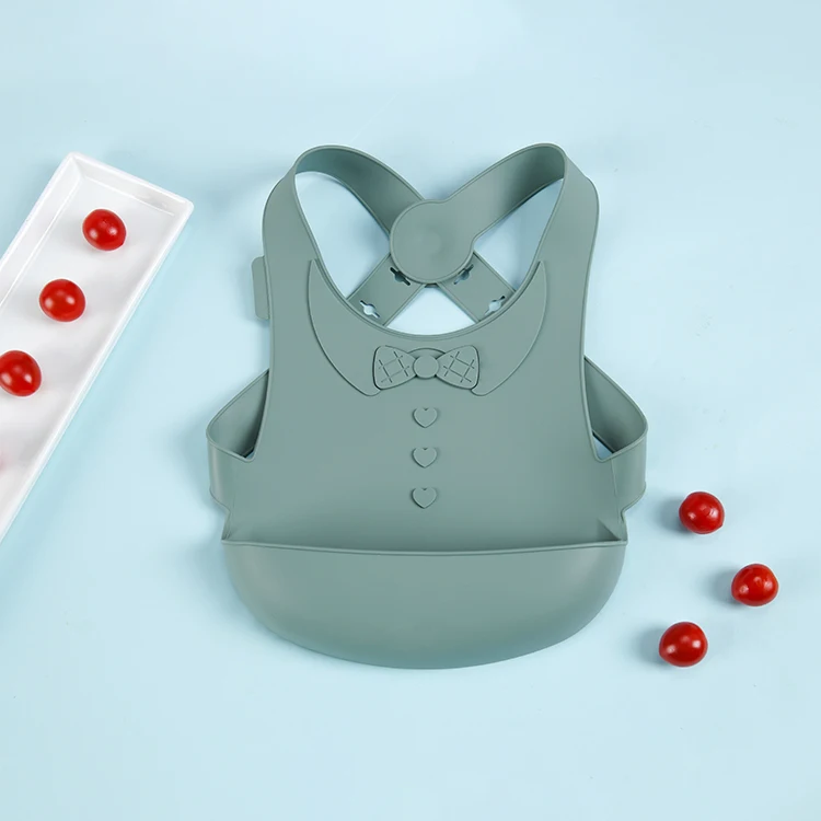 Custom silicone bib waterproof and collapsible button type silicone girl bibs baby feeding bib