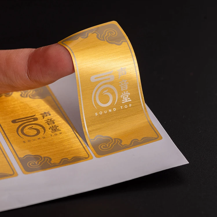 Custom Brand Logo Gold PVC Waterproof Packaging Stickers Printing Manufacturer Vinyl Metal Product Label Stickers
