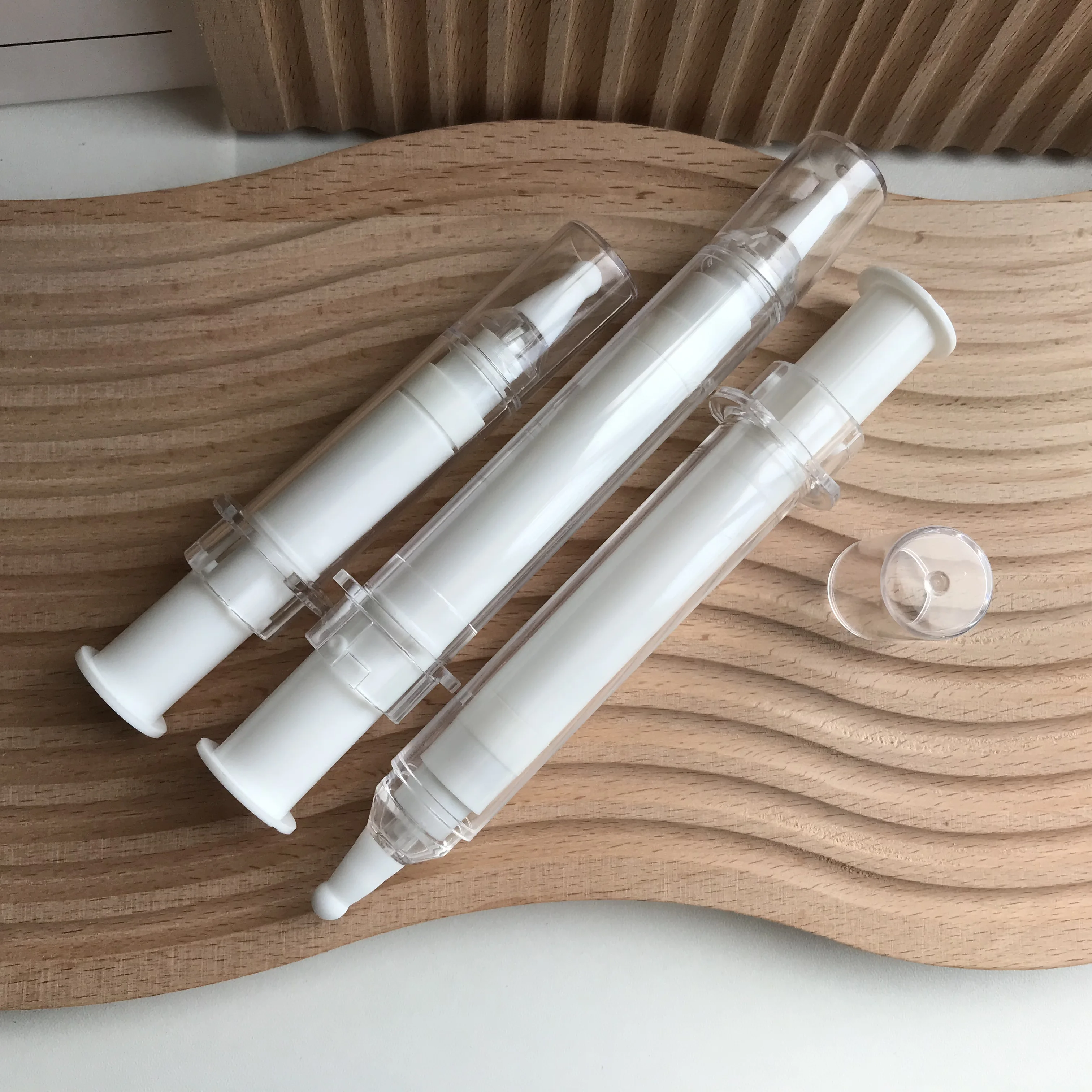 Wholesale 5ml 10ml 20ml push airless syringe bottle airless serum press button dropper bottle