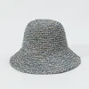 M gris
