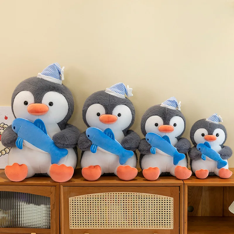 ぬいぐるみ  penguin boarding small Cute Penguin with Mini Shark Doll - Soft Plush Toy Gift