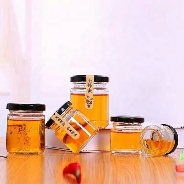 Factory Produced Food Grade Empty Clear Round Glass Honey Jar supplier