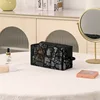 Small black octagonal bag