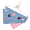 Light blue bear in red and white checkered pattern