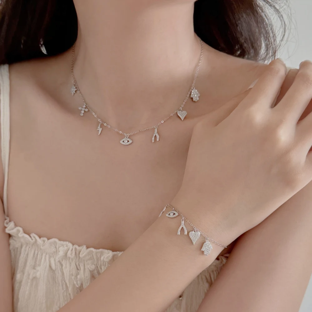 KAKODIY unique design 925 Sterling Silver multiple symbols octagonal thunder evil heart hand eye Y letter shape pendant zirconia bracelet detail 1